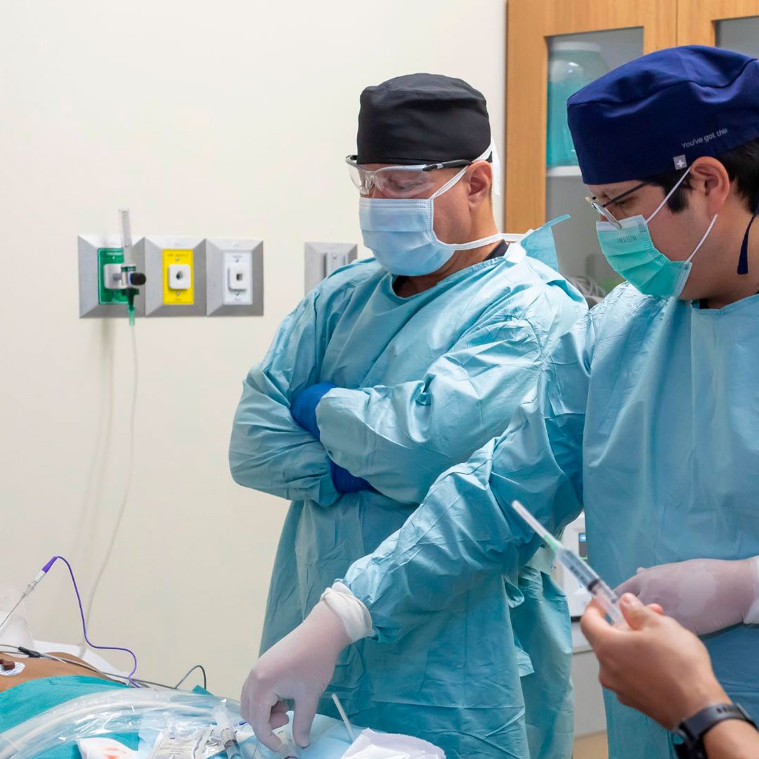 Dr Makis with a patient